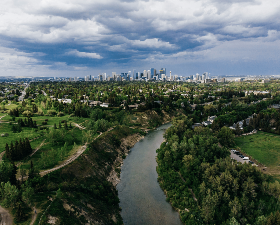 City skyline beside a river, illustrating the Alberta deregulated energy market
